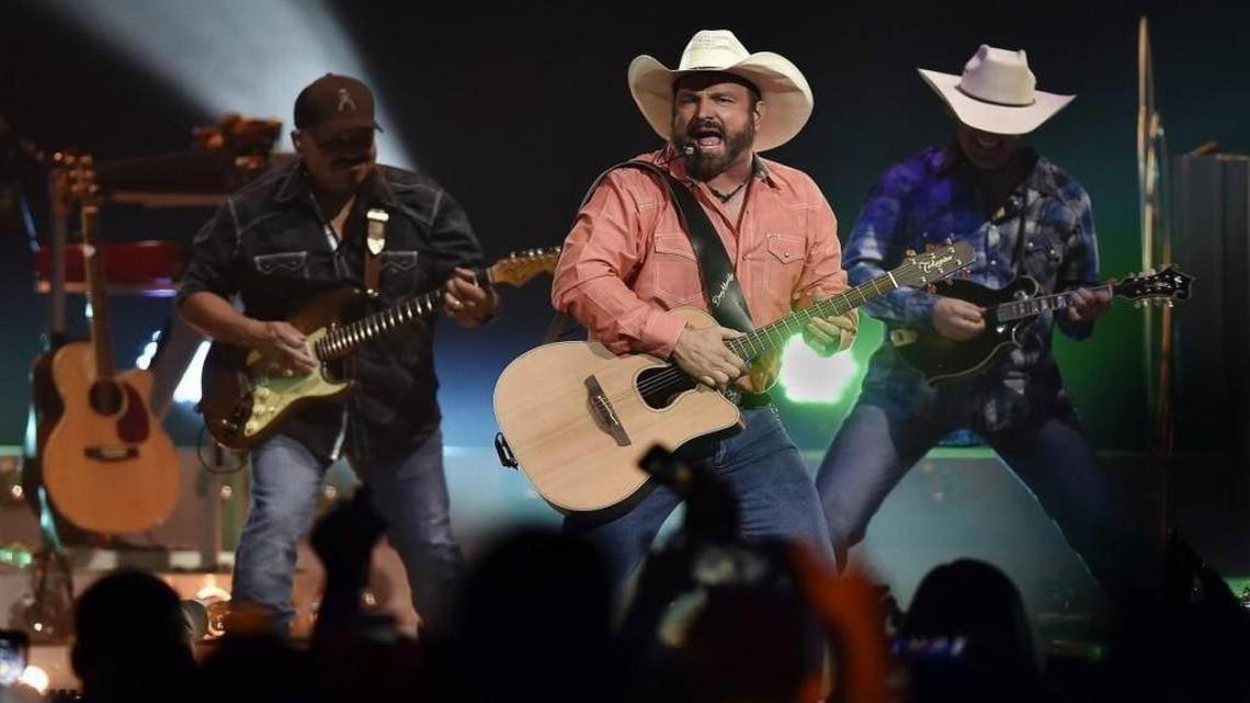 Garth Brooks, seen here performing at Kansas City’s Sprint Center in May, surprised a couple that got engaged at his show in Oklahoma City on Saturday by offering to pay for their honeymoon.