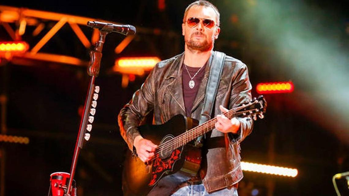 FILE - In this June 10, 2016 file photo, Eric Church performs at the CMA Music Festival at Nissan Stadium in Nashville, Tenn. Country star Church struggled to hold back tears in a tribute to the victims of the mass shooting at a country music festival in Las Vegas and debuted a song he wrote in their honor called "Why Not Me." Church was a headliner at the Route 91 Harvest Festival two days before a gunman opened fire on a crowd of thousands Sunday night, Oct. 1, 2017. Photo by Al Wagner