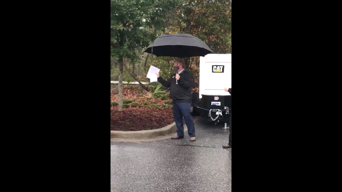 Chick-fil-A manager Jerry Walkowiak helped direct traffic at a COVID-19 vaccine drive-thru in Mt. Pleasant, South Carolina, on Jan. 22, 2021.