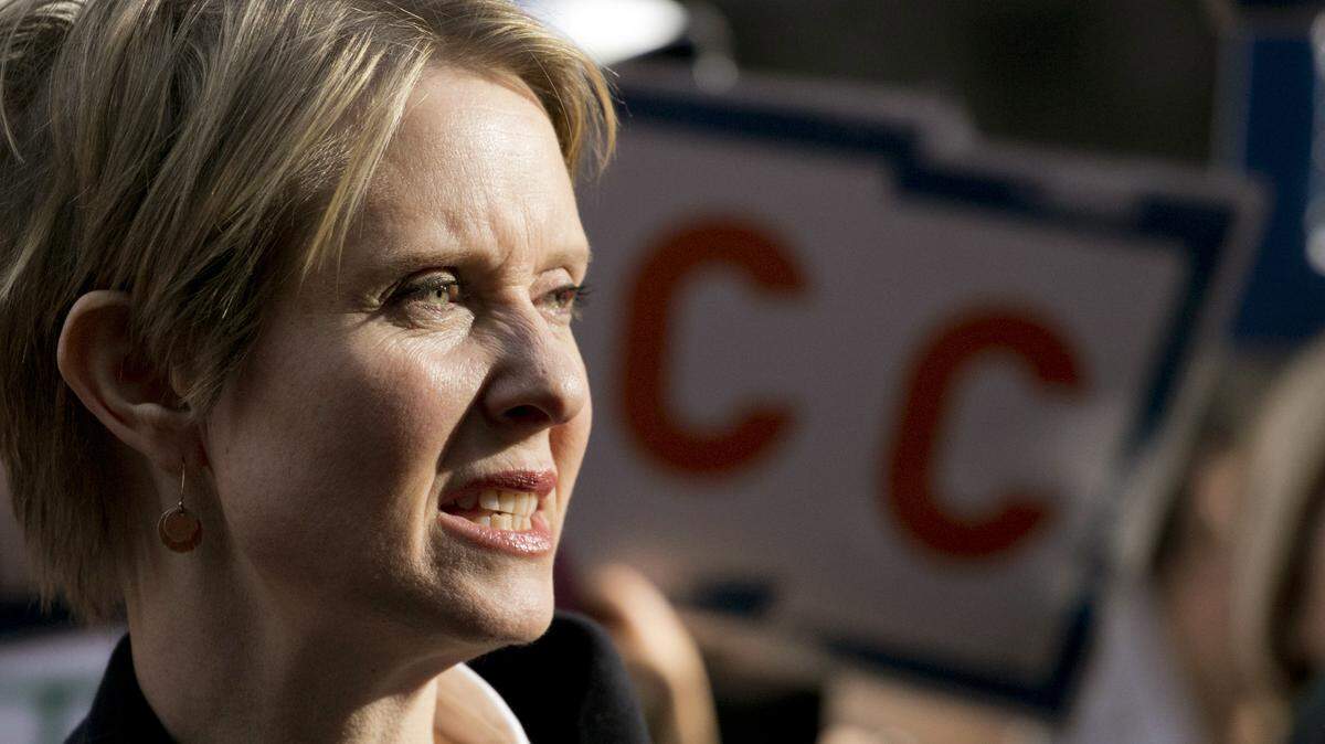 New York Democratic gubernatorial candidate Cynthia Nixon joins hundreds of May Day protesters on Wall Street, Tuesday, May 1, 2018, in New York.