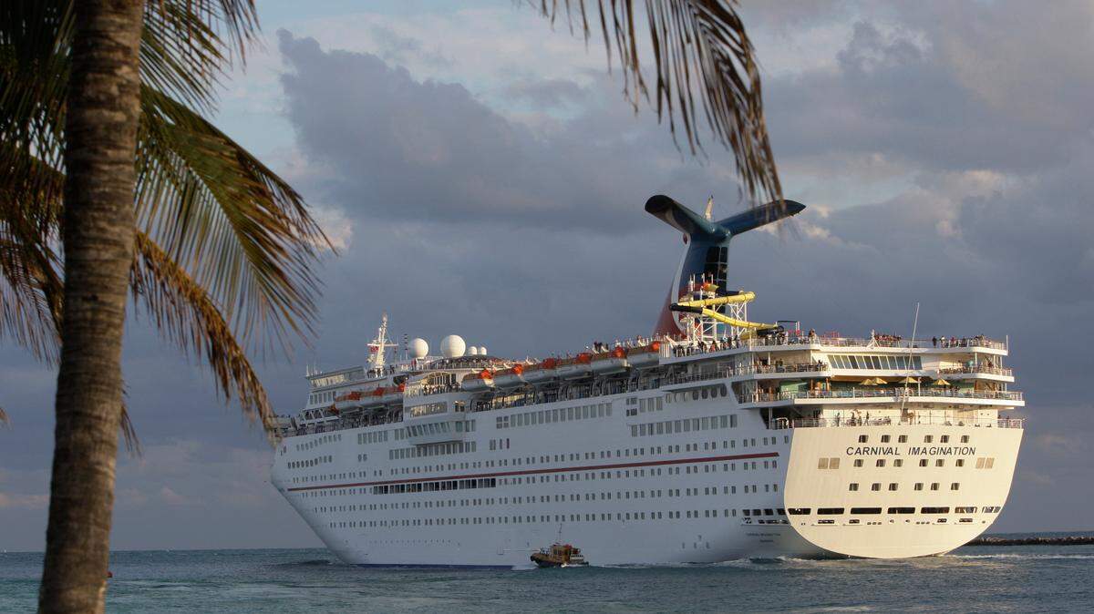 A Carnival Imagination cruise ship passes South Pointe Park in Miami Beach in January 2011. An Alabama woman claimed she couldn’t go on her Carnival Cruise due to “medical reasons” to swindle $2,400, Georgia officials say.