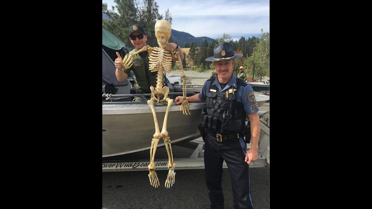 Oregon State Police recovered a plastic skeleton from a lake after a fisherman reported seeing possible human remains.