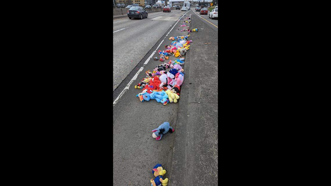 Toys scattered across Interstate-5 at Burnside Bridge in Oregon.