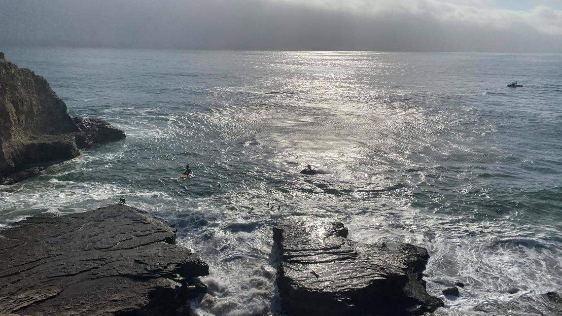 A body was recovered at Panther State Beach after a 30-year-old standing on rocks was swept to sea, California officials said.