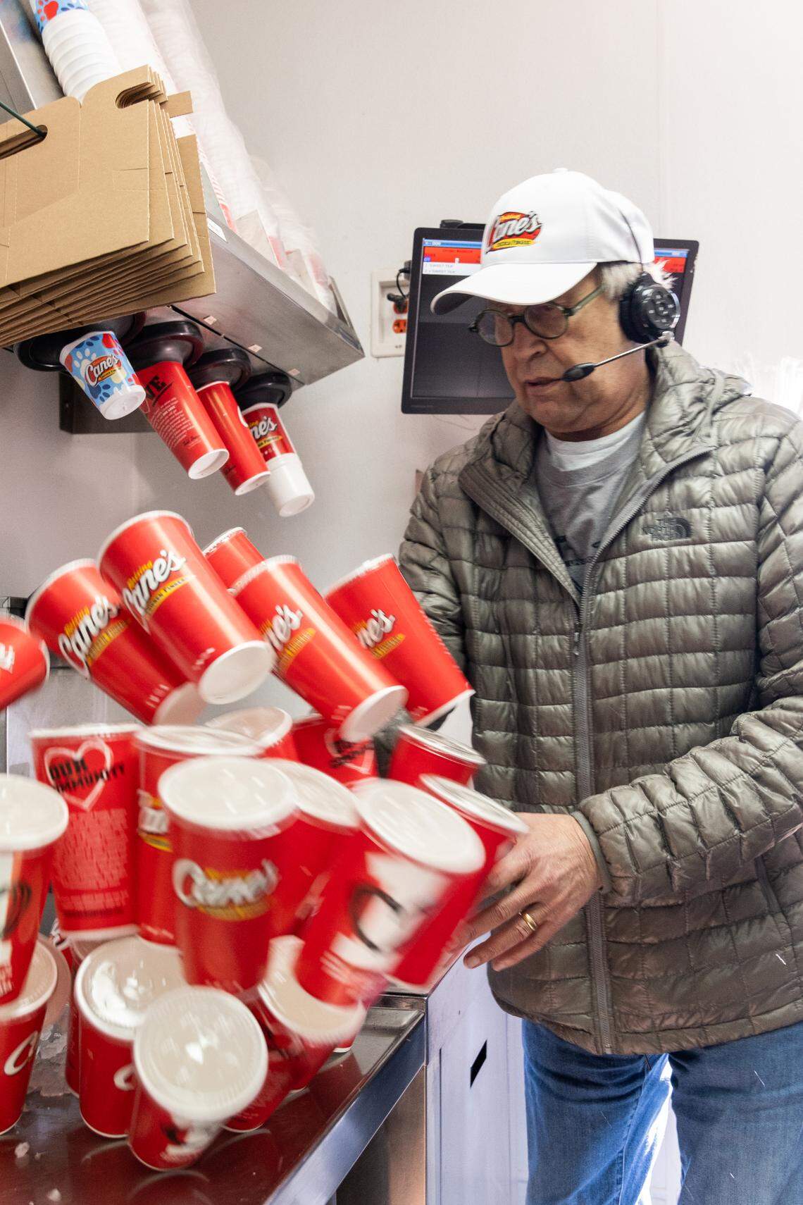 Company officials said “hilarity ensued” when actor and comedian Chevy Chase asked to step behind the counter and serve guests at Raising Cane’s in North Charleston on Dec. 2, 2021.