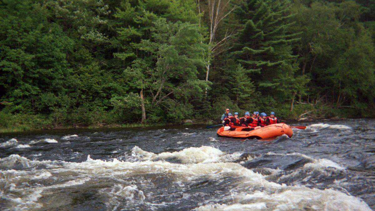 A group paddles on a whitewater rafting trip on the Kennebec River in this Aug. 23, 2006 file photo in The Forks, Maine. A man died while rafting on Maine’s Dead River on Oct. 1, 2022, according to officials. (AP Photo/Beth J. Harpaz, File)