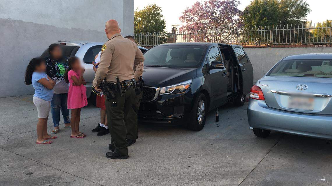 A mother's quick thinking at a taco truck in Industry, California, on Sunday saved her family from an intimidating fake cop with a gun, according to Los Angeles County deputies.