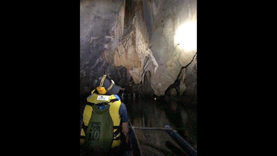 The researchers placed baited traps in the cave waters to catch the eels to take measurements.