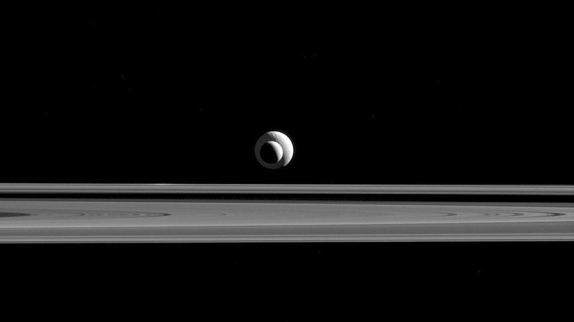 This Sept. 24, 2015, image made available by NASA shows the moon Enceladus. A new laser technology will be deployed on future missions to moons like Enceladus to search for signs of life, according to a new study. (NASA/JPL-Caltech/Space Science Institute via AP)