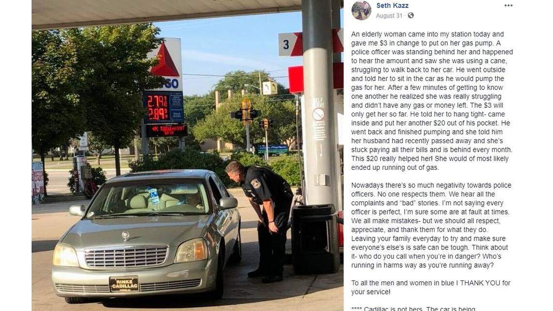 St. Clair, Michigan, Police Officer Todd Bing talks to resident Dolores Marotta, 75, after the owner of a Citgo gas station says he paid for her gas when she only had $3.