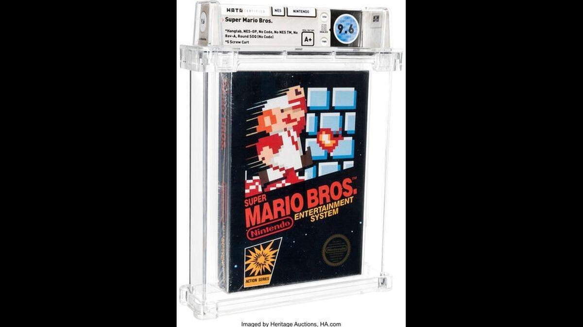 This photo provided by Heritage Auctions shows an unopened copy of Nintendo’s Super Mario Bros., purchased in 1986 and then forgotten about in a desk drawer for decades that has sold for $660,000 at auction. Heritage Auctions in Dallas said the video game sold Friday, April 2, 2021. (Emily Clements/Heritage Auctions via AP)
