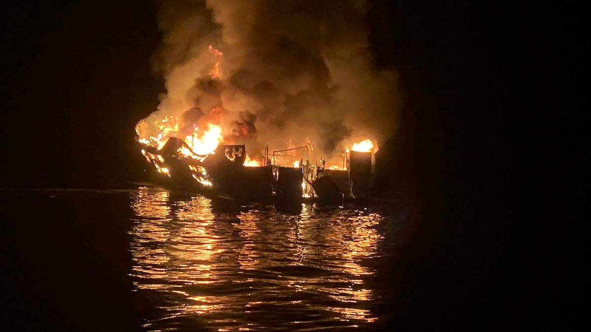 FILE - In this Sept. 2, 2019, file photo provided by the Santa Barbara County Fire Department, the dive boat Conception is engulfed in flames after a deadly fire broke out aboard the commercial scuba diving vessel off the Southern California Coast. The captain of a scuba diving boat that caught fire and sank off the coast of California last year, killing 34 people who were trapped below deck, was indicted Tuesday, Dec. 1, 2020, on federal manslaughter charges for one of the deadliest maritime disasters in recent U.S. history. (Santa Barbara County Fire Department via AP, File)