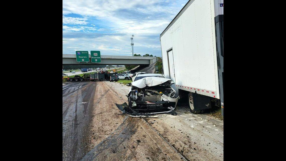 Eight people were hospitalized after mud spilled on a highway, causing several cars to lose control, according to Florida officials.