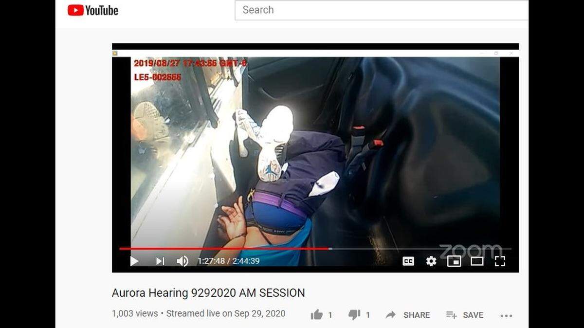 Police in Aurora, Colorado hogtied a woman and put her inside a patrol car, where she fell head first, crying ‘I can’t breathe.’ The officer ignored her, video shows.