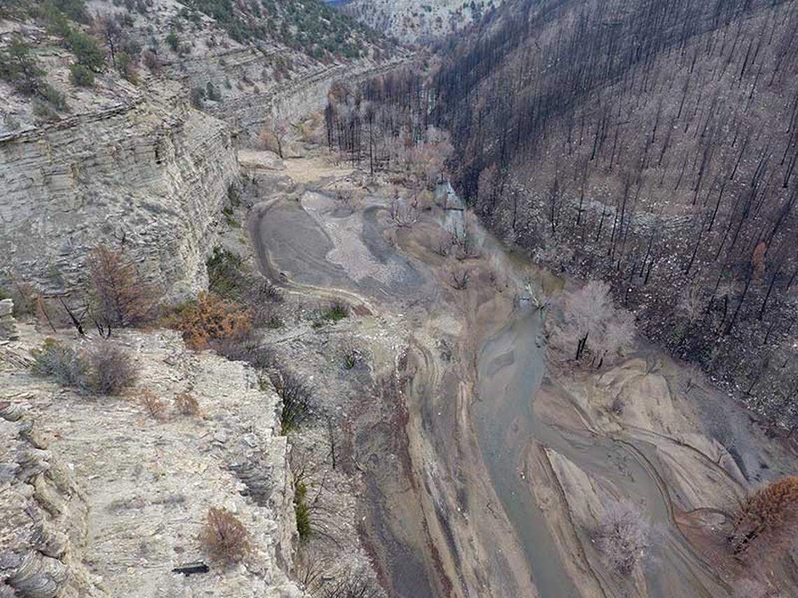 A photo shows Strawberry River in Utah, two months after the Dollar Ridge fire in 2018, including “catastrophic sediment transport altering river morphology and fish habitat to an extreme,” according to researchers.