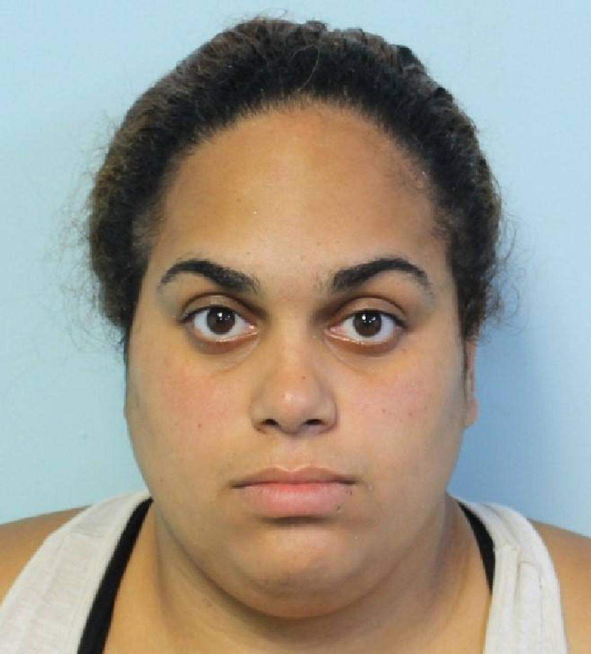 Yaliber Aguiar, 26, faces grand larceny charges in connection with the scam, police said.
