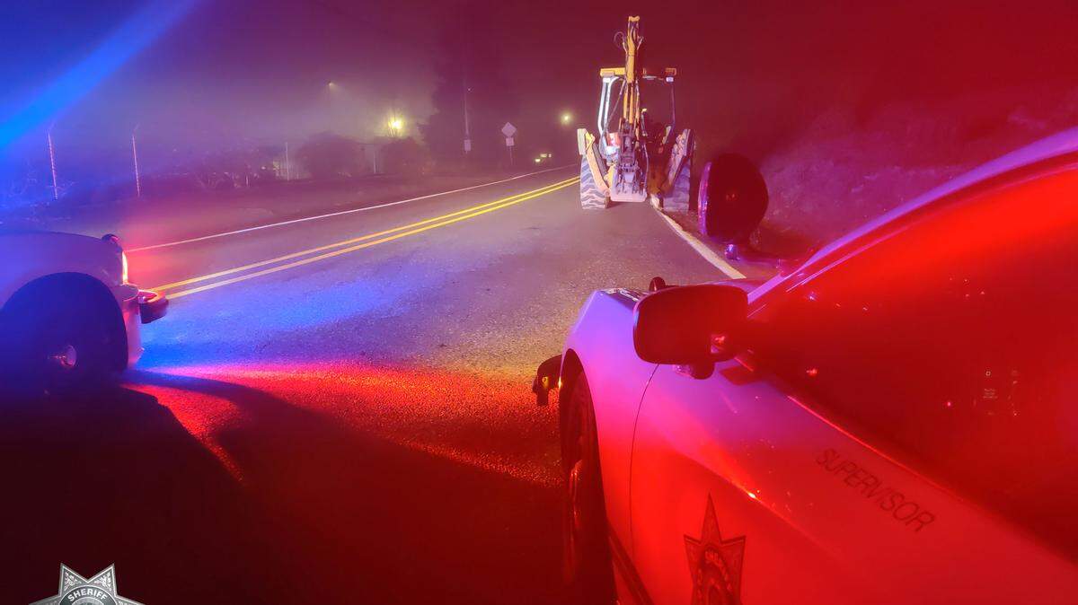 A man driving a stolen backhoe on the wrong side of the road at 10-20 mph was arrested after dodging police for an hour, Oregon cops said.