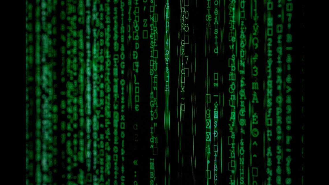 Two men used a stolen police password to access a federal database, steal people’s personal information and extort them, according to prosecutors in New York.