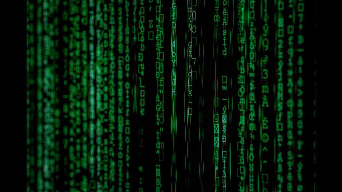 Two men used a stolen police password to access a federal database, steal people’s personal information and extort them, according to prosecutors in New York.