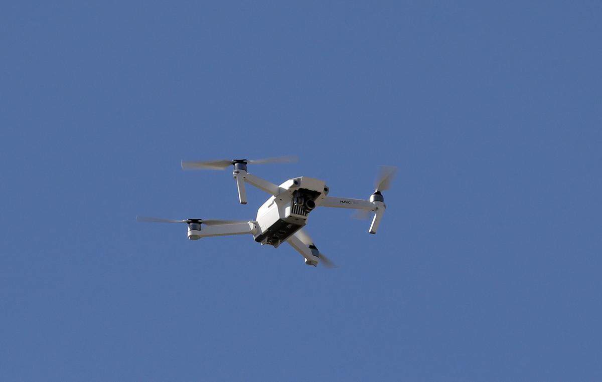 A drone was sighted over several San Luis Obispo neighborhoods, often flying near utility poles. Charter Communications confirmed the drone flights were scheduled to perform maintenance inspections.