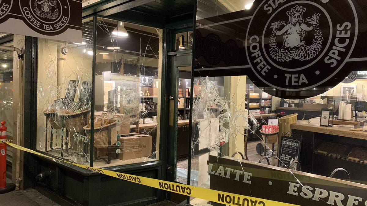 The original Starbucks in Pike Place Market was vandalized in Inauguration Day protests, Seattle cops say.