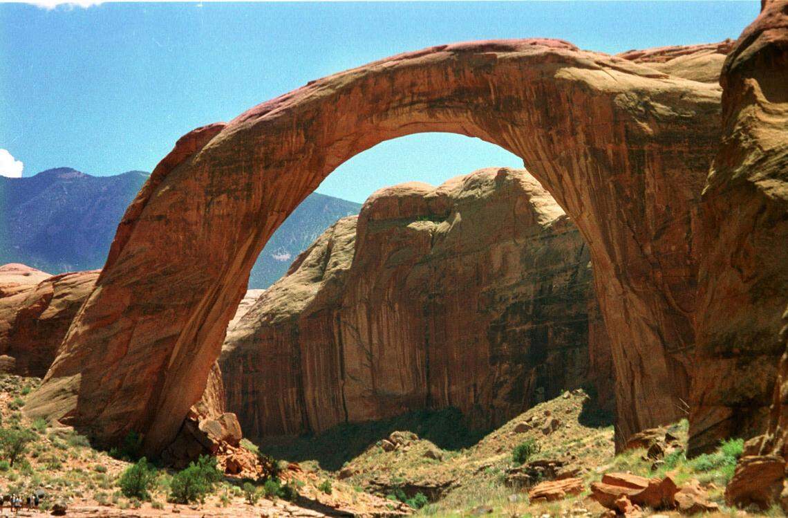 Rainbow Bridge National Monument is a star attraction at Lake Powell on the Utah side, as shown July 16, 1998. Two hundred ninety-feet tall and spanning 275 feet, the river-carved arch is made of sandstone.