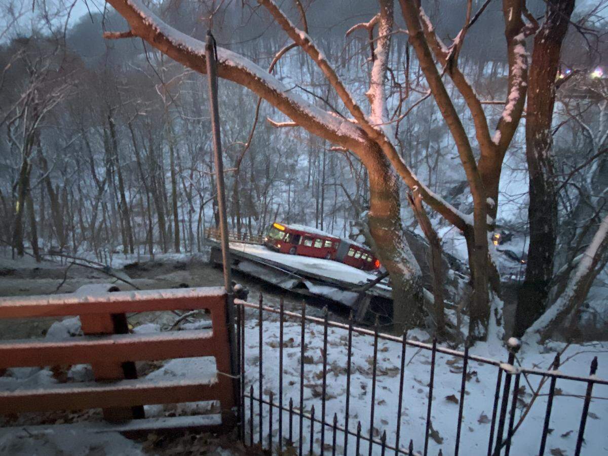 A bus was stuck dangling near a collapsed bridge in Pittsburgh on Jan. 28.