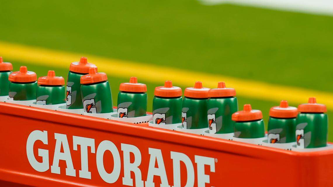 Gatorade bottles are seen before an NFL football game between the Baltimore Ravens and the Houston Texans, Sunday, Sept. 20, 2020, in Houston. The sports drink may cost more in 2022 due to supply chain shortages the brand’s parent company, PepsiCo, experienced during the coronavirus pandemic. (AP Photo/Matt Patterson)
