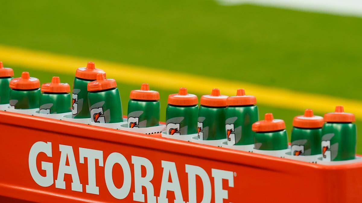 Gatorade bottles are seen before an NFL football game between the Baltimore Ravens and the Houston Texans, Sunday, Sept. 20, 2020, in Houston. The sports drink may cost more in 2022 due to supply chain shortages the brand’s parent company, PepsiCo, experienced during the coronavirus pandemic. (AP Photo/Matt Patterson)