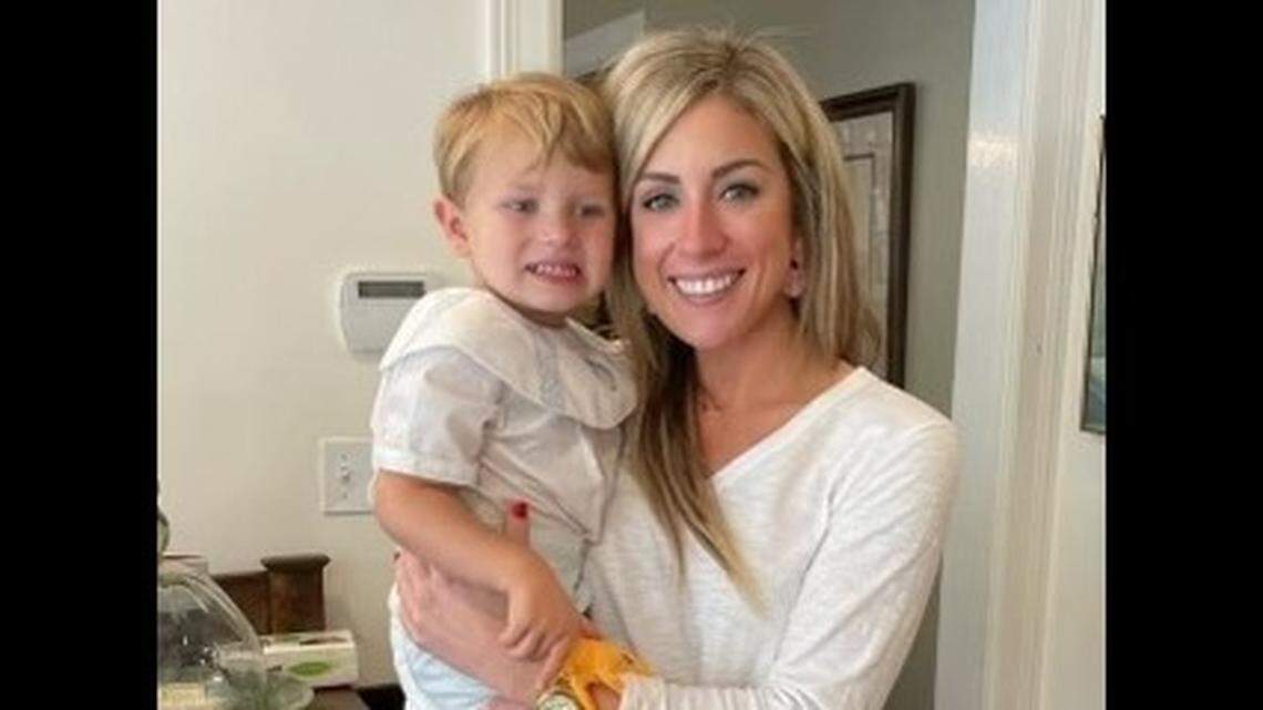 Katherine Elkins, 34, with her nephew. Elkins was seriously injured after she was struck by a hit-and-run driver while cycling away from a jazz festival in New Orleans, her sister said.