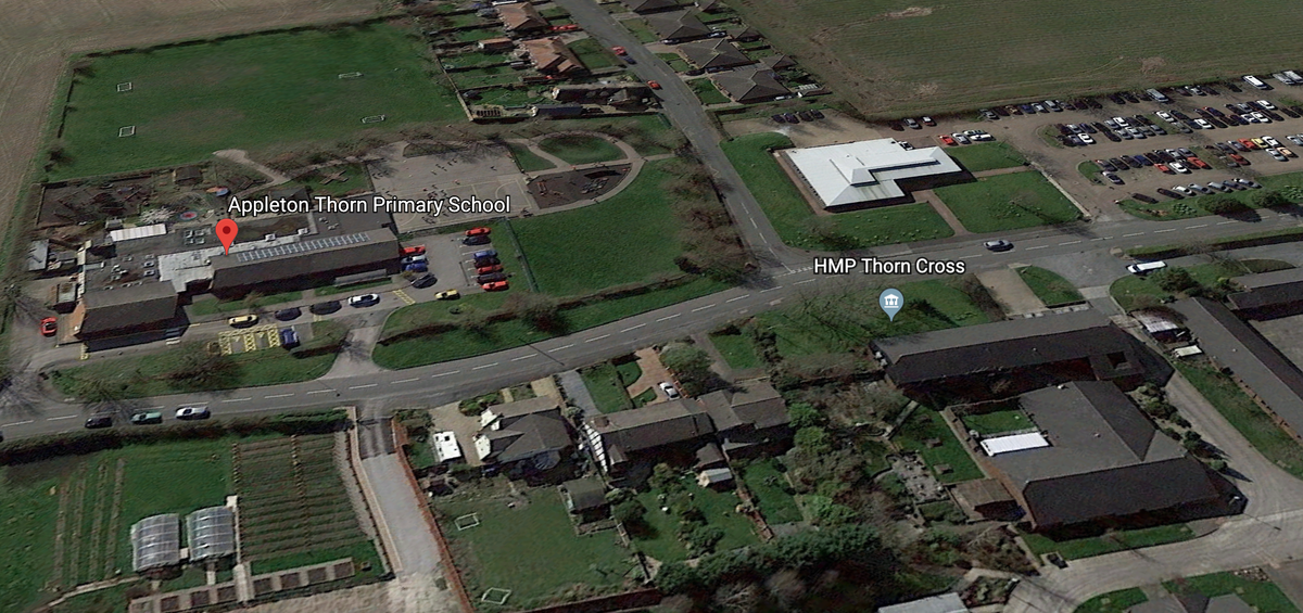 The distance between the school and prison is shown above in this screenshot from Google Earth.