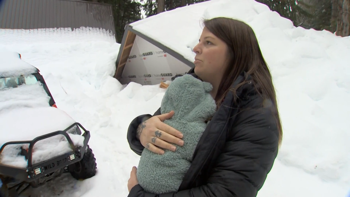 Emily Elkins, from Leavenworth, said she and her baby were “lucky to be alive” after the roof of their trailer collapsed — with them inside.