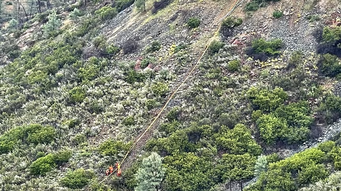 A dad and his son plunged 500 feet down an embankment off of Highway 49, deputies said.