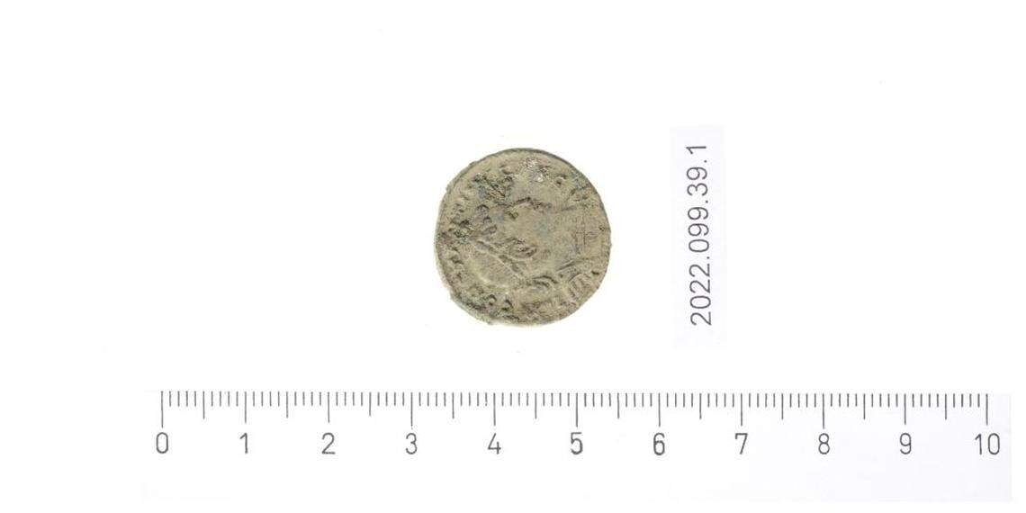 An ancient Roman coin that was discovered at the site.