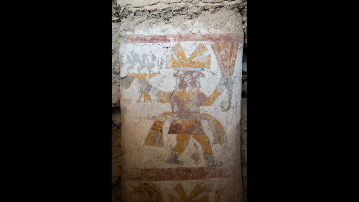 The pillar’s upper figure is still, unlike the lower figure which appears to be moving, archaeologists said.