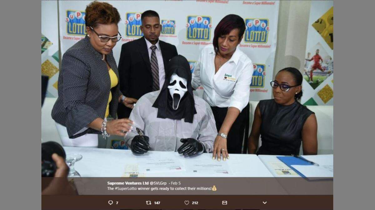 A. Campbell wore a Scream mask to receive a check from the Jamaican Super Lotto for the equivalent of $1.1 million U.S.