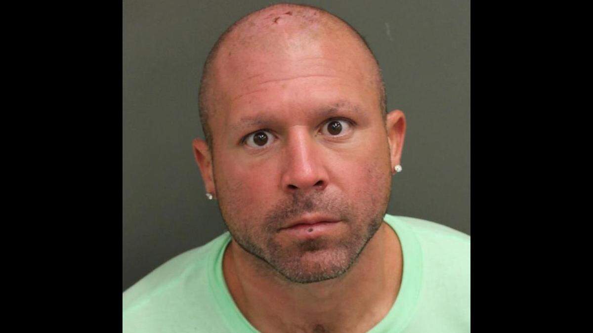 An Orlando, Florida, man practicing karate was arrested on animal cruelty charges after police said he kicked swans at Lake Eola Park.