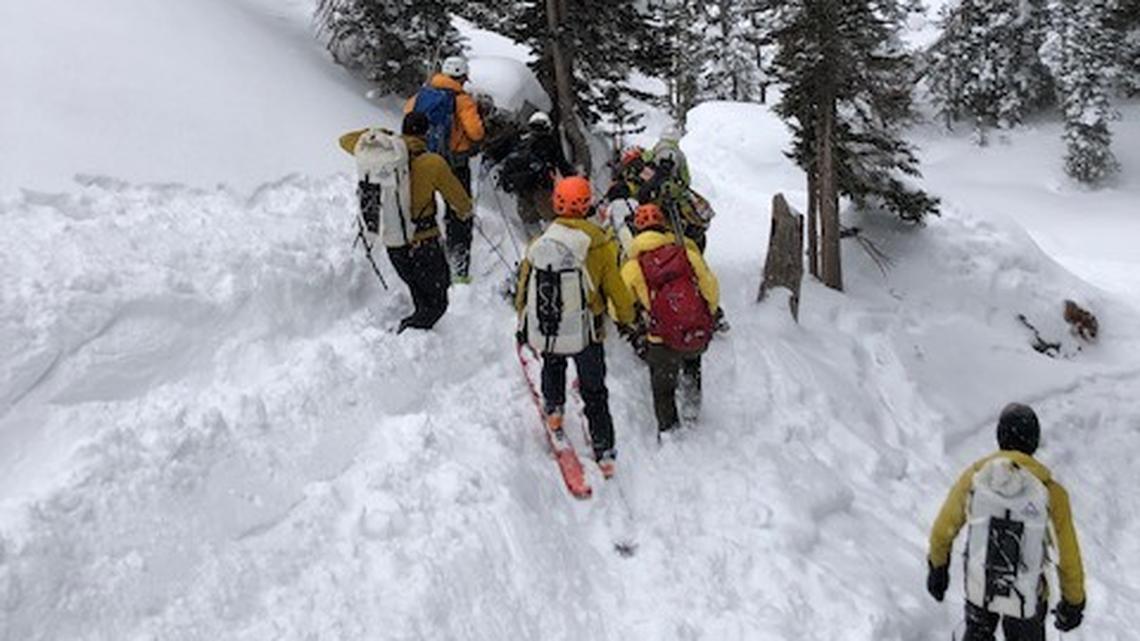 RMNP Search and Rescue Team members descending toward Dream Lake.