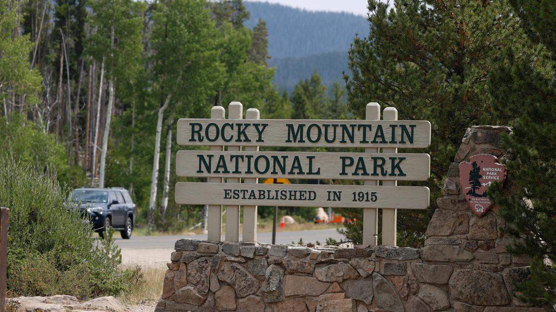 The sign for Rocky Mountain National Park stands near the gate Wednesday, Aug. 5, 2020, in Grand Lake, Colo. (AP Photo/David Zalubowski)