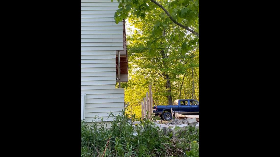 Brawn, who’s a construction worker, took a photo of the backside of the garage, where he precisely cut through walls and siding. Photo from Gabriel Brawn on Facebook.