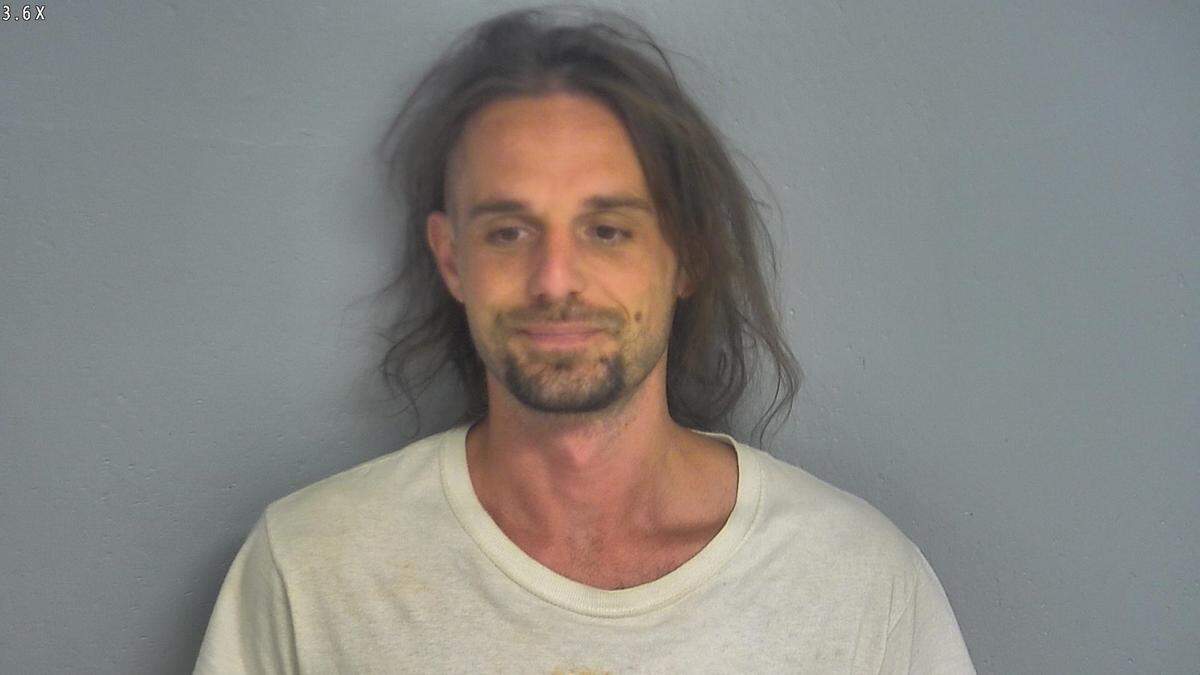 Dustin Burns, 33, faces charges of tampering with an electronic monitoring device, jail records said.