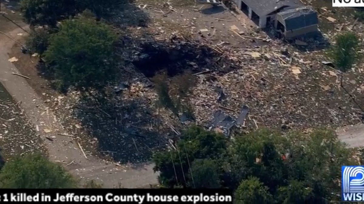A house explosion in Jefferson County, Wisconsin, killed one as the blast knocked out power, sent debris flying and displaced residents, officials said. Screengrab from WISN.