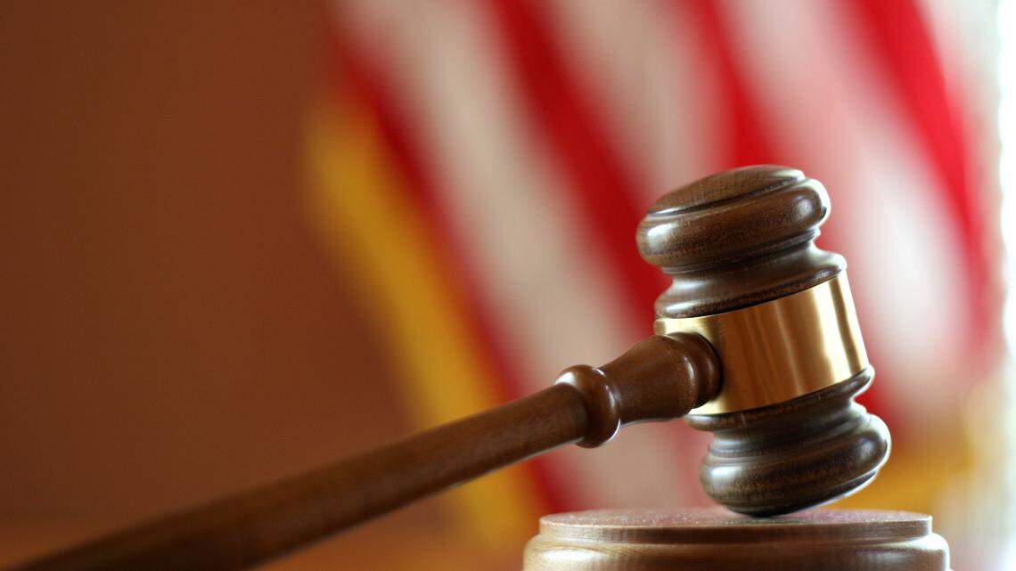 A Boston pizza shop owner is accused of forced labor, threatening to have employees deported and attacking them, feds say. He was arrested.