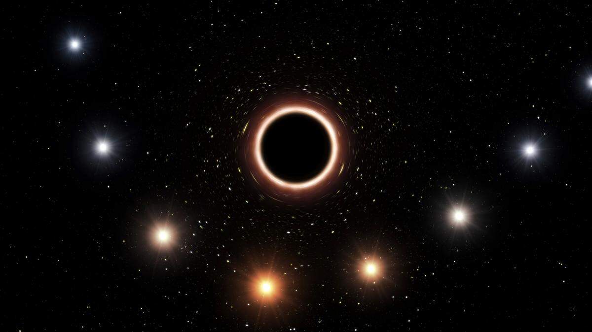 This artist’s impression provided by the European Southern Observatory in July 2018 shows the path of the star S2 as it passes close to the supermassive black hole at the center of the Milky Way galaxy. A European Scpace Agency telescope has just observed black holes consuming the same stars repeatedly, puzzling scientists. (M. Kornmesser/ESO via AP)