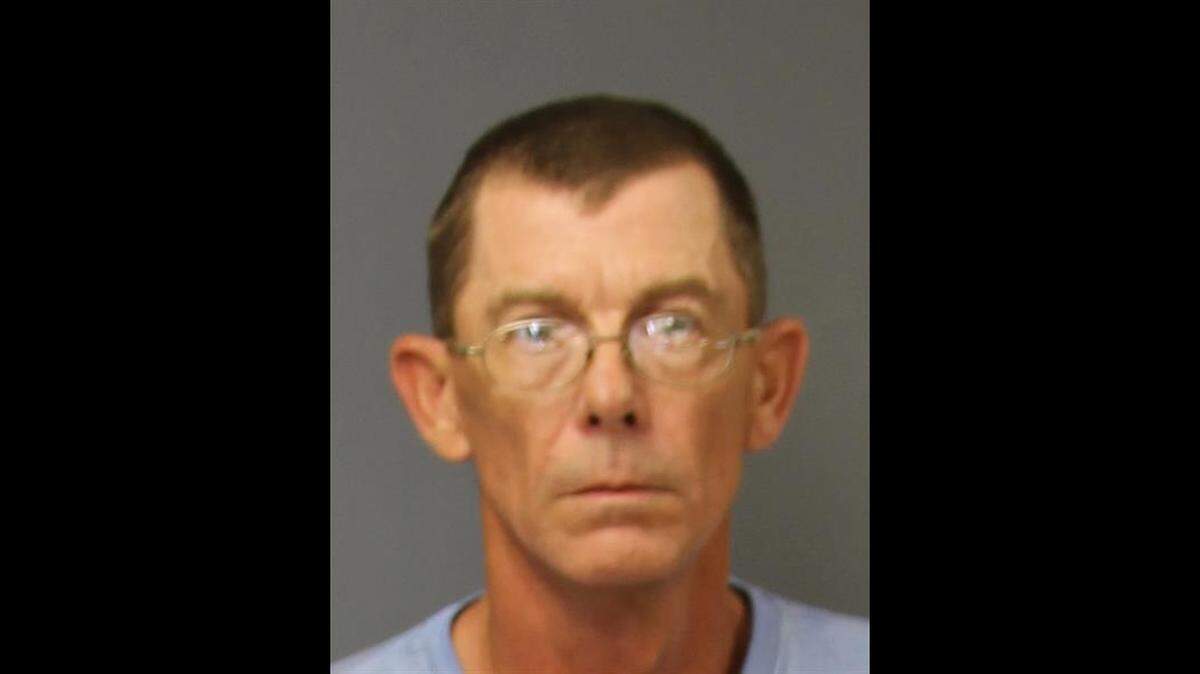 Michael R. Enoch, 54, is charged with first-degree kidnapping and larceny of a motor vehicle.