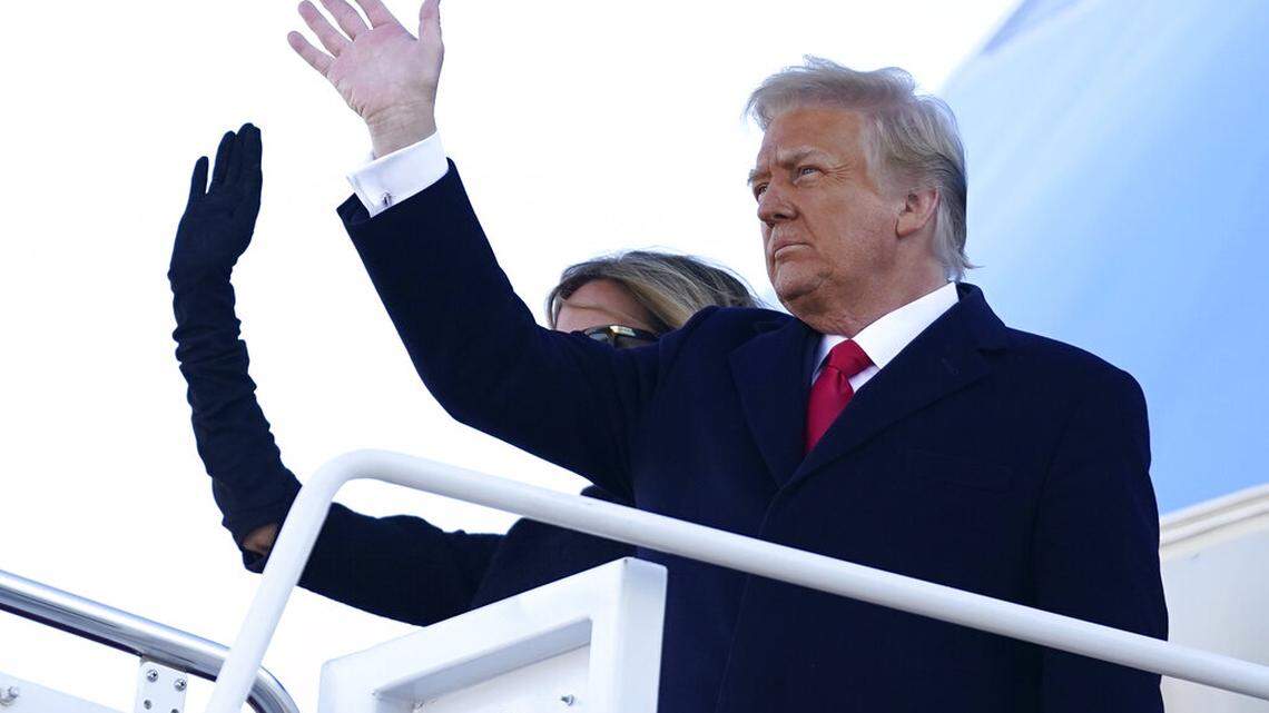 President Donald Trump and first lady Melania Trump board Air Force One at Andrews Air Force Base, Md., Wednesday, Jan. 20, 2021.(AP Photo/Manuel Balce Ceneta)