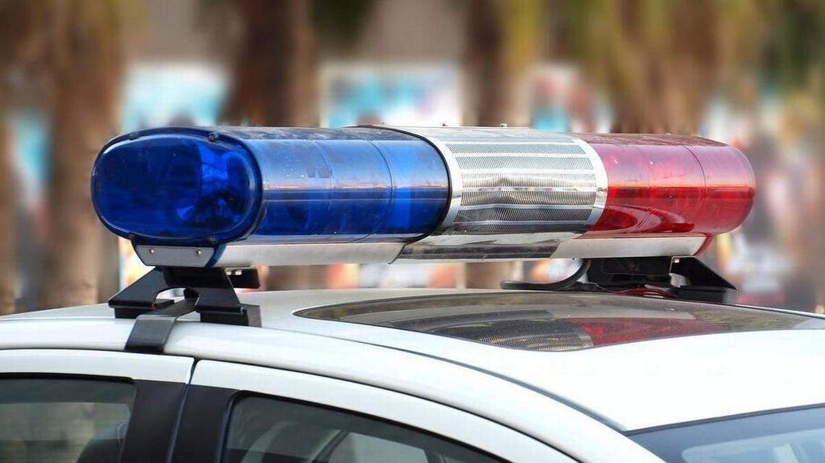 A woman is dead and a tow truck driver in critical condition in Watertown, Massachusetts, after the driver struck and killed the woman crossing the street, and a man witnesses said is her son stabbed the driver multiple times in the torso, authorities said.
