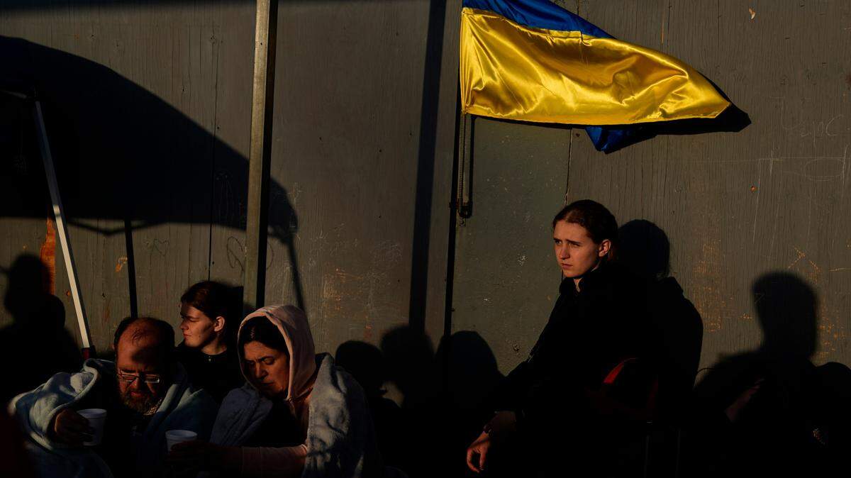 Ukrainian refugees wait near the U.S. border Monday, April 4, 2022, in Tijuana, Mexico. (AP Photo/Gregory Bull) About 78% of people in the U.S. support welcoming up to 100,000 refugees in the United States — the highest level of support recorded since 1939, according to a Gallup poll.