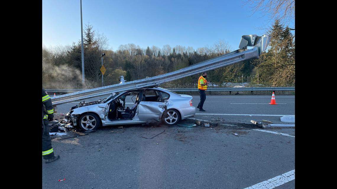A Washington State Patrol trooper shared photos of a car wedged underneath a highway guardrail. The driver told troopers he fell asleep before the crash.