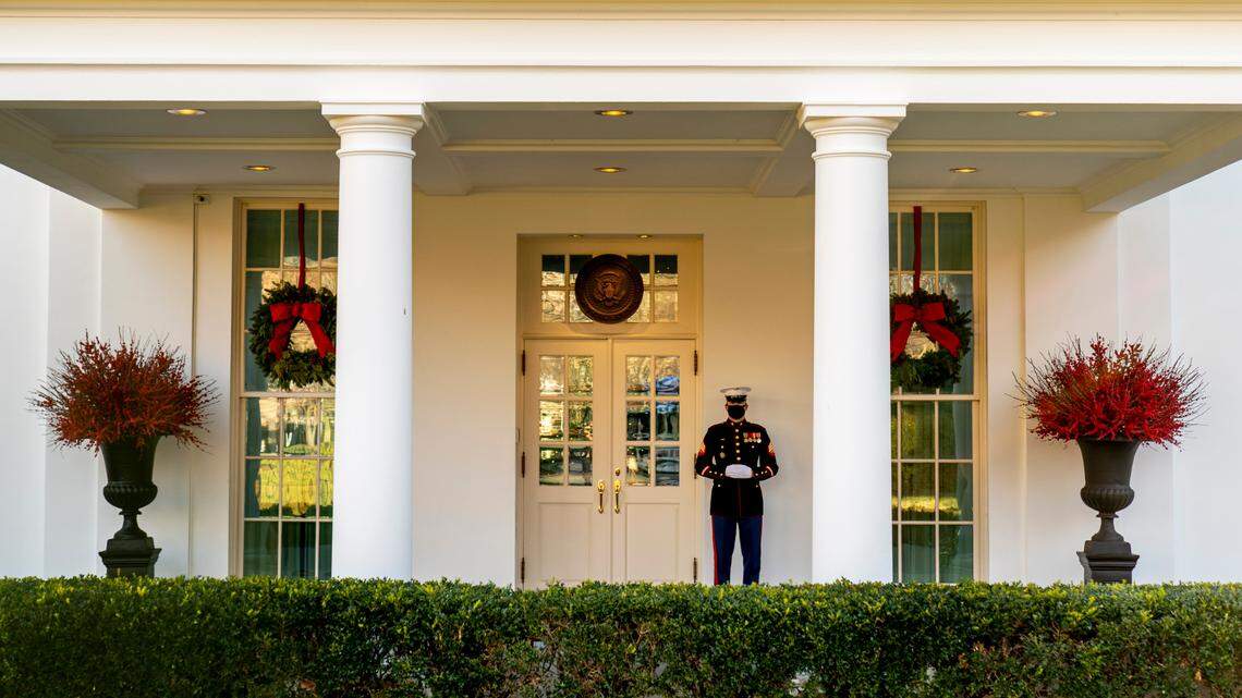 A Marine stands outside the entrance to the West Wing of the White House, signifying the President is in the Oval Office. Former President Barack Obama’s official presidential portrait was unveiled Sept. 7. Here’s how other presidents have reacted to theirs.